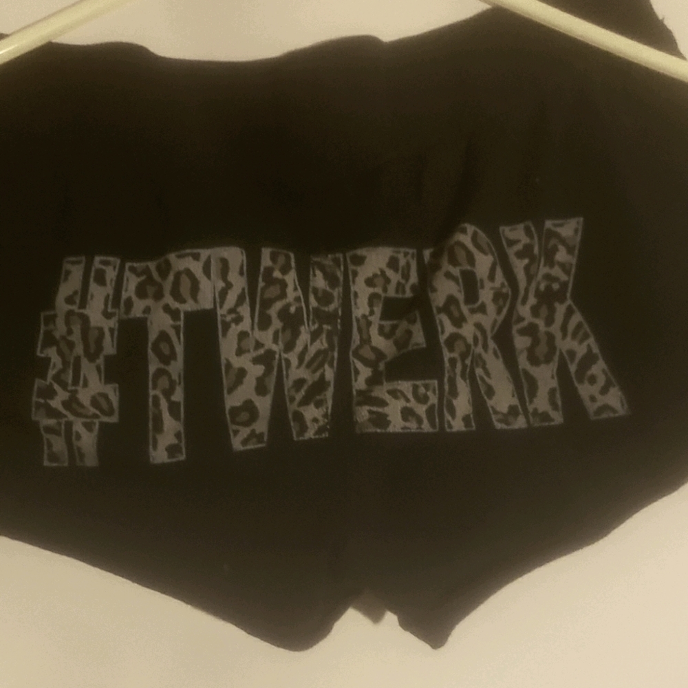 Black shorts with cheetah writing